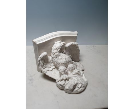 A Parian ware Wall Bracket in the form of an eagle supporting a shelf, 9 1/2in  Chips to top and back, no makers mark visible