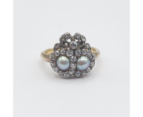 A 19th Century Pearl and Diamond ribbon and heart Cluster Ring close-set two half pearls within frame of old-cut diamonds and