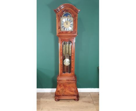 A reproduction walnut Longcase Clock with arched moon phase brass dial, 8 day movement with quarter repeating Westminster chi