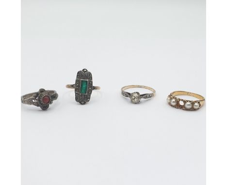 A pearl and Diamond Ring A/F together with three Dress Rings 