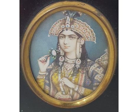 INDIAN SCHOOL, 19th CENTURY. Portrait miniature depicting a female dignitary, on ivory, oval, 2 1/2 x 1 3/4 in (Ivory Referen