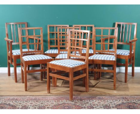 Edward Barnsley (1900-1987); A Set of eight walnut Dining Chairs, the six singles with square trellis backs, the two carvers 