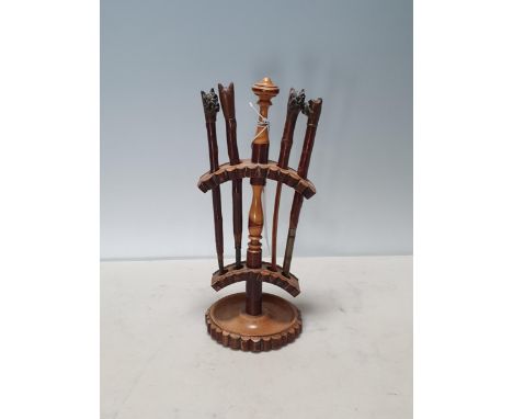 A set of antique treen Tools with bulldog head handles within turned wooden Stand 8 1/2in H 