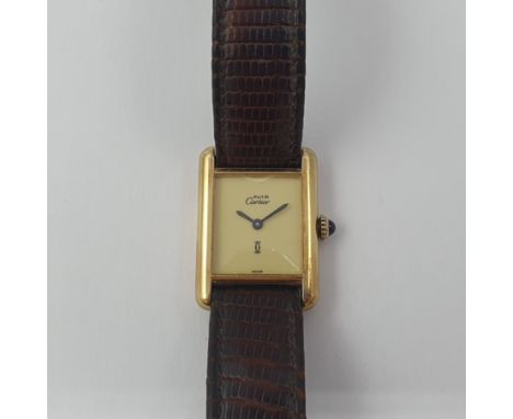 A lady's 1980's Must de Cartier manual wind Wristwatch the rectangular cream dial with black hands and blue cabochon to crown