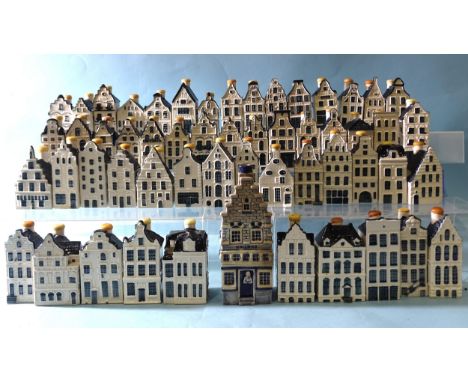 A large collection of Bols gin miniatures in blue and white Delft ceramic house decanters, produced for Dutch airline KLM, ap