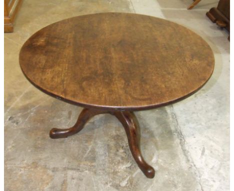 An antique oak tripod table, cut-down to form a coffee table, 80cm diameter. 