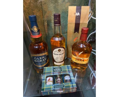 Three Bottles of Whisky which includes Single Speyside Malt Glen Moray Mellowed in Chardonnay Barrels, Glen Grant and Isle of