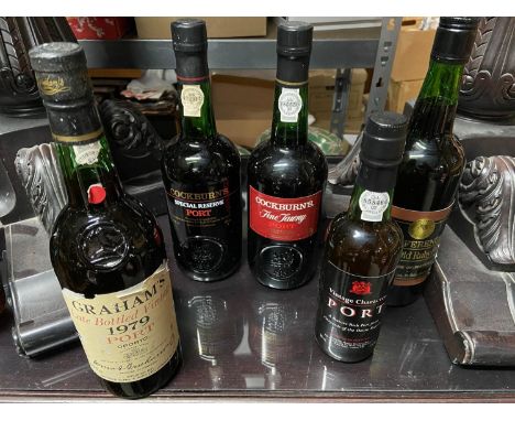 5 Bottles of port. Cockburn's Special Reserve Port, Conference Fine Old Ruby Port, Vintage Character Port, Cockburn's Fine Ta