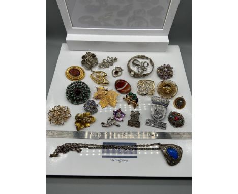 A Quantity of various vintage brooches which also includes Edinburgh Transport Conductor cap badge, Deloitte official support