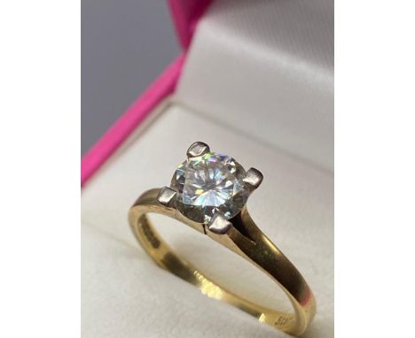 A Ladies 18ct gold and single diamond, 1ct Ring. Ring size O. 'Starlight' Fully hallmarked. 