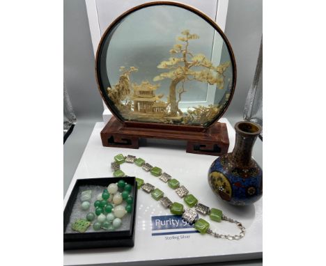 A Collection of oriental collectables which includes Chinese Cloisonné vase, Japanese cork display, Jade beads and vintage ne