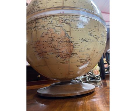 A Vintage Philips 12 inch Terrestrial Globe. Sat upon a wooden base. 