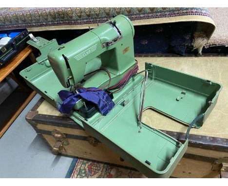 A Vintage Elna Supermatie sewing machine with carry case 