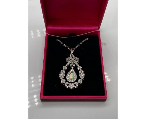 A Beautiful example of a ladies 925 silver, cz and pear shaped opal pendant with necklace. 