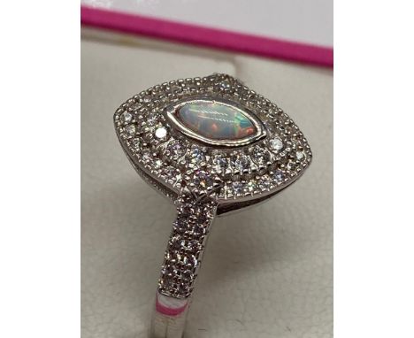 A Ladies 925 Silver cz and opal panned ring. Ring size S. 