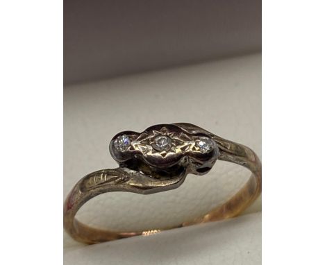 A Ladies 18ct and Platinum diamond ring. [Ring size K] [2 Grams] 