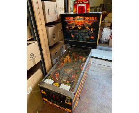 A Vintage Williams High Speed Pinball Machine. Lights up with sounds. May need attention in areas. 