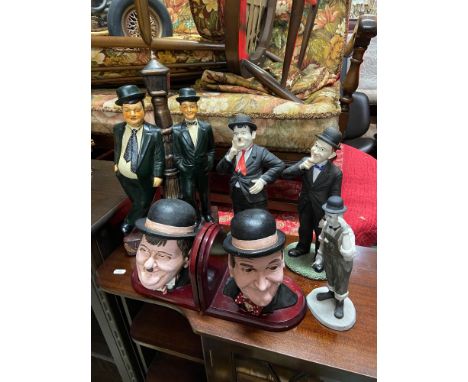 A Selection of Laurel and Hardy figurines and bookends. [Lamp post figurine is repaired] 