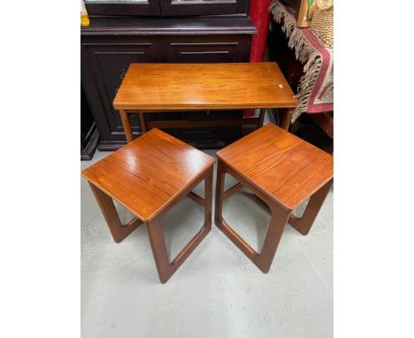 A Retro teak McIntosh of Kirkcaldy fold out card table with two matching under tables. 