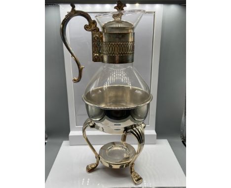 A Vintage F.B Rodgers Silver Company silver plated stand and claret jug. 