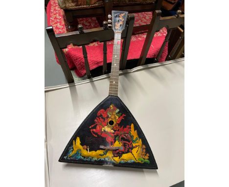 A Russian lacquered and hand painted Balalaika with three strings. 