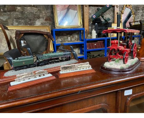 A Collection of train models which includes country artist train and loco, Two silver plated train models and steam engine 