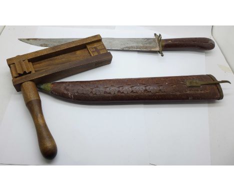 A knife with scabbard, a/f and a football rattle 