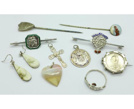 Silver jewellery including a Military Police brooch, a silver RAF ring, a base metal set enamelled stick pin decorated with a