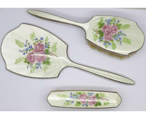 A three piece silver and enamel brush and mirror set, some enamel a/f 