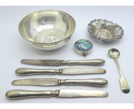 A pierced silver dish, Birmingham 1902, a white metal bowl, four silver handled knives, a pill box and a mustard spoon 