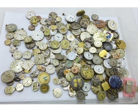 A collection of watch movements, including seven lady's Omega, plus Tissot, Cyma and Universal 