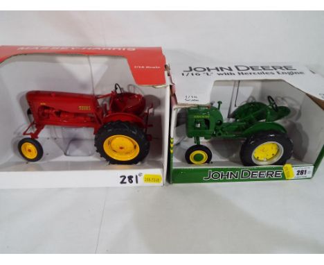 Diecast - a John Deere 1:16 scale with Hercules engine, appears mint in original packaging and a Massey - Harris 1:16 scale t