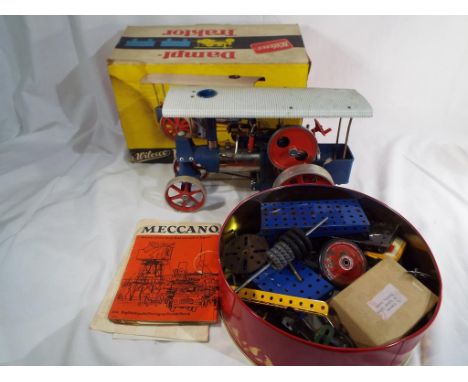 A good lot to include a Wilesco model steam roller and a quantity of vintage Meccano 