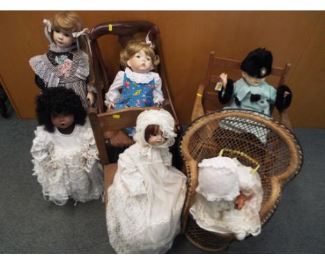 Vintage Dolls - six dressed vintage and modern dolls of which two with stands and four seated in chairs 
