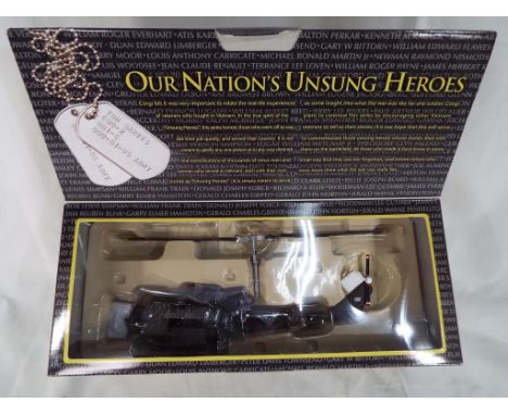 Corgi - a Corgi Unsung Heroes model No. 50401 Uh.ic.huey hog Gunship Helicopter US. Army Vietnam mint in mint box