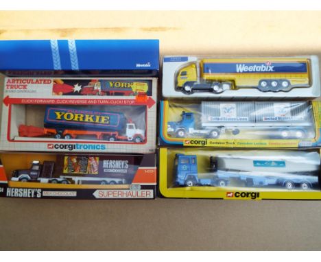 A collection of Corgi Container Trucks comprising #1107 US Lines, #1109 Aral, # 3400H Hershey's, #1002 Yorkie and #59518 Weet