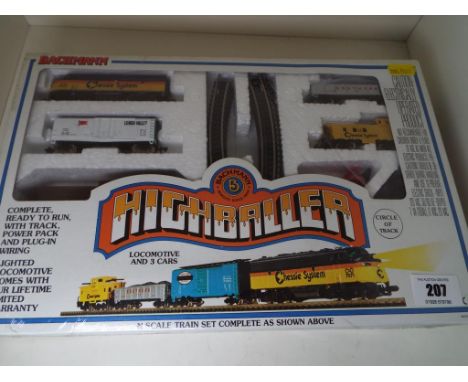Model Railways N Guage - a Bachmann Highballer boxed set, locomotive with illumination, three cars with track and power pack,