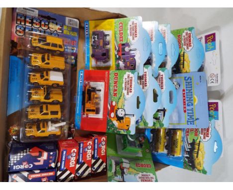 A good mixed lot of diecast model vehicles to include Thomas the Tank Engine, Ertl locomotives, all sealed in their original 