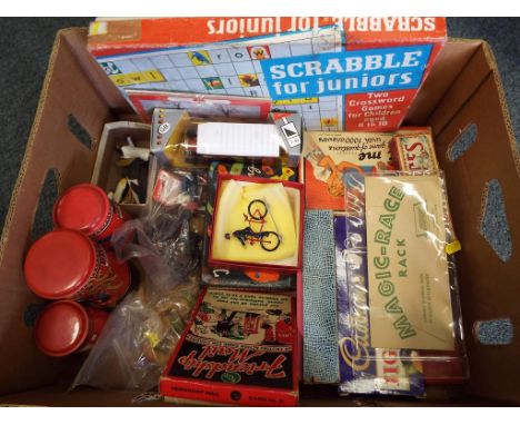 A good mixed lot to include 3 vintage dominoes sets in original boxes, 3 tin pillar box money boxes, Magic Race, Friendship M