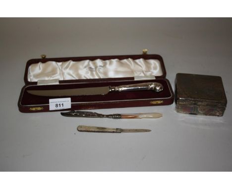 Cased silver handled bread knife a Victorian silver and mother of pearl handled butter knife, silver and mother of pearl frui