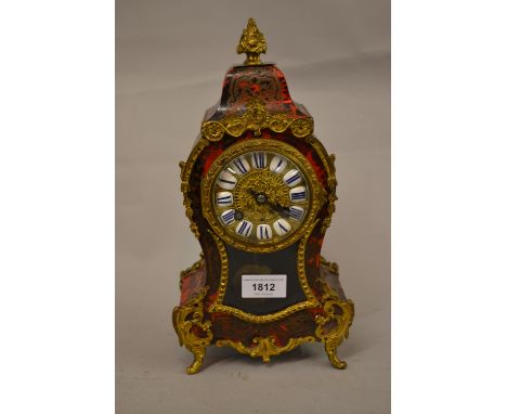 Late 19th or early 20th Century French buhl and gilt metal mounted mantel clock, the circular dial with Roman cartouche numer