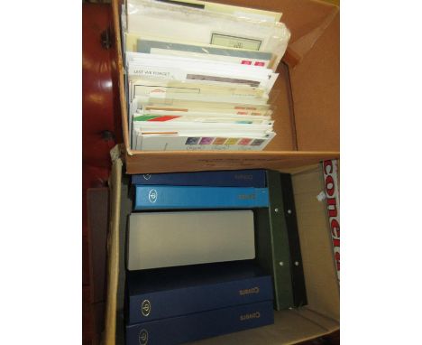 Four albums Great Britain First Day and commemorative postal covers, together with two albums Great Britain post mark slogans