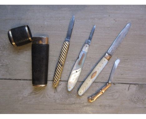 18th Century yellow metal and leather necessaire case (empty), a yellow metal mounted steel penknife set with diamond, ruby a
