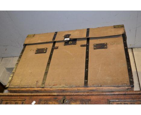 19th Century canvas, brass and metal mounted travelling trunk with hinged cover, 30ins wide 