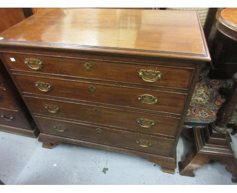 George III mahogany straight front chest of four graduated drawers with brass handles and escutcheons on ogee bracket feet, 3