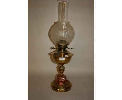 Arts and Crafts brass and copper baluster form oil lamp with etched glass shade and chimney 