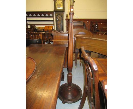 Mahogany turned and fluted column standard lamp with retailer's label for Warings 