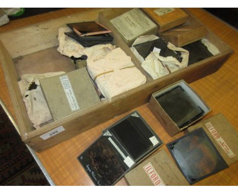 Box containing a collection of various magic lantern slides by Wellington, Ilford and others 