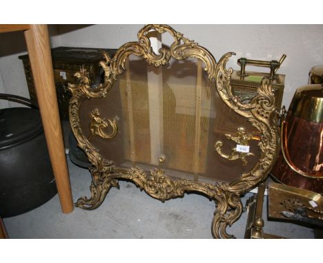 Early 20th Century gilt brass firescreen of rococo design 