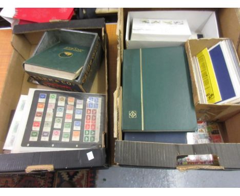 Two boxes containing a quantity of World stamps, loose and in albums and a quantity of First Day covers etc. 